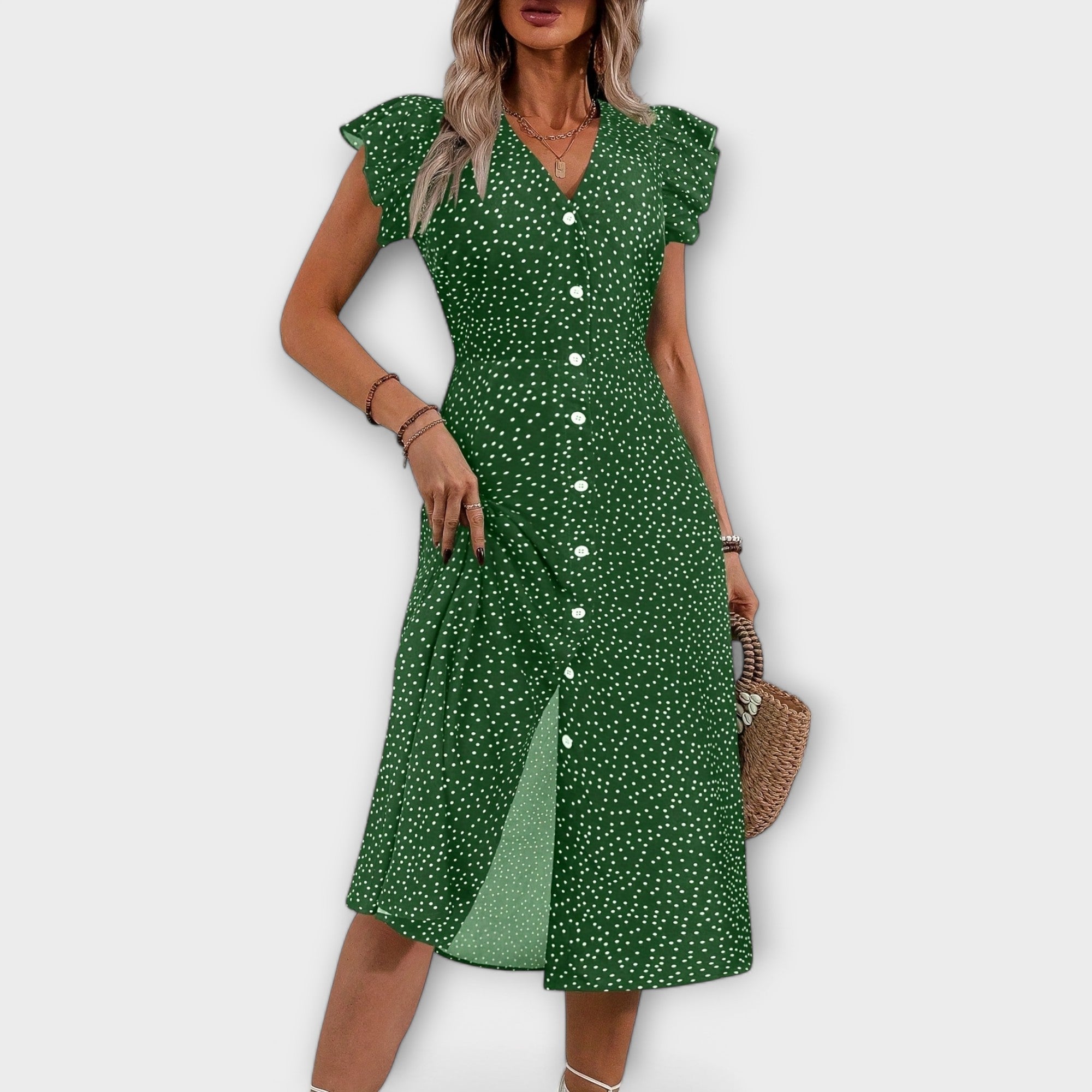 Elegante vestido midi con lunares