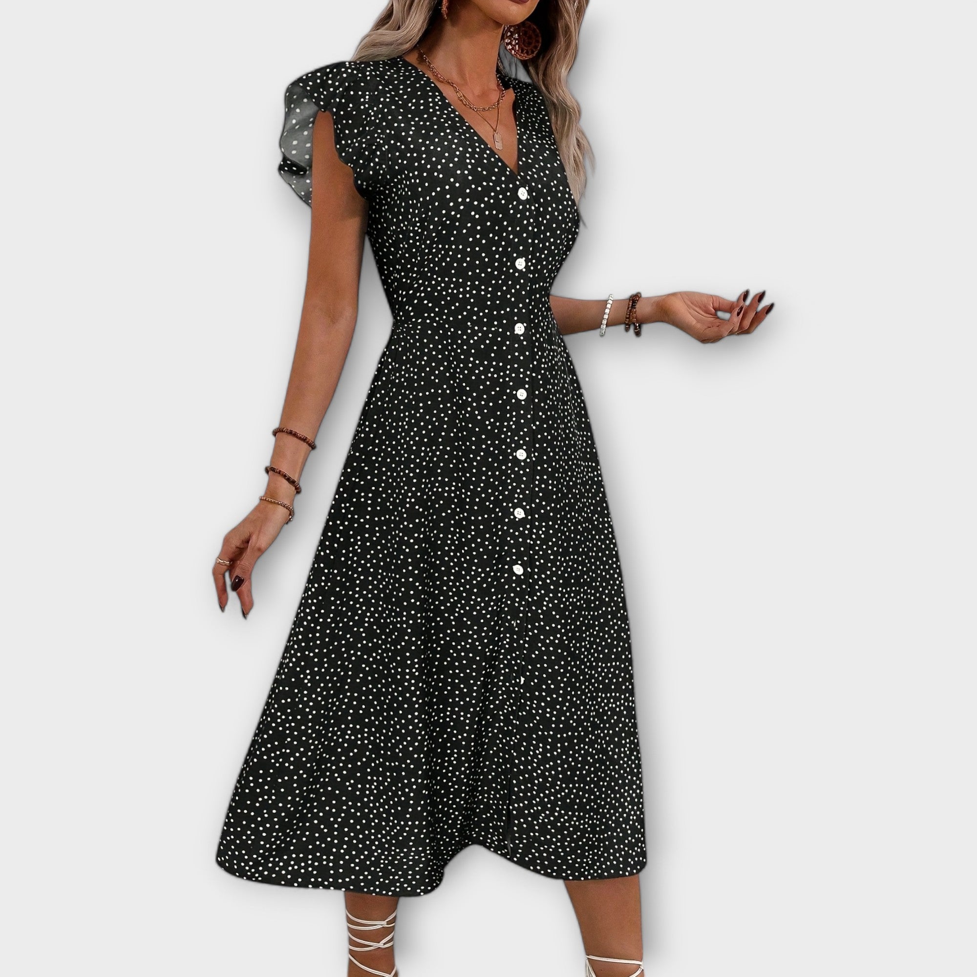 Elegante vestido midi con lunares