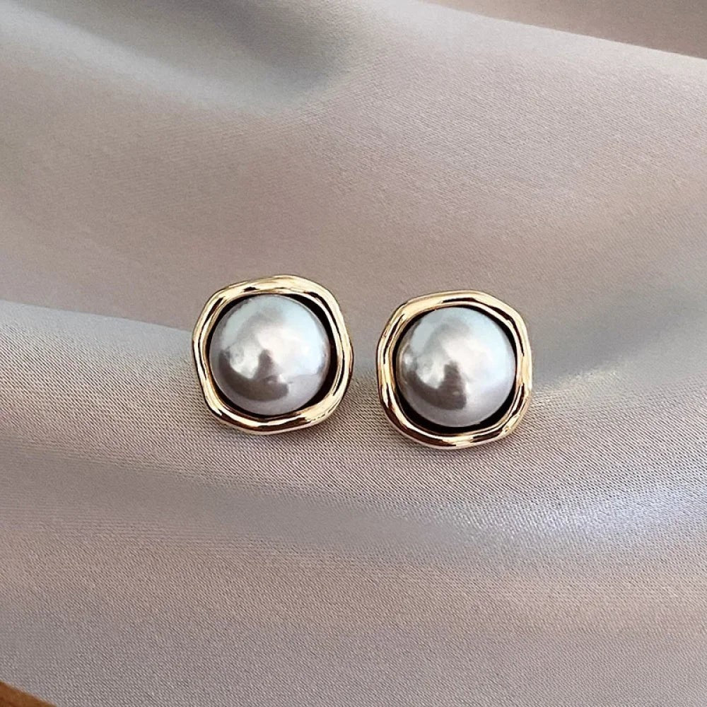 Pendientes de perlas negras elegantes