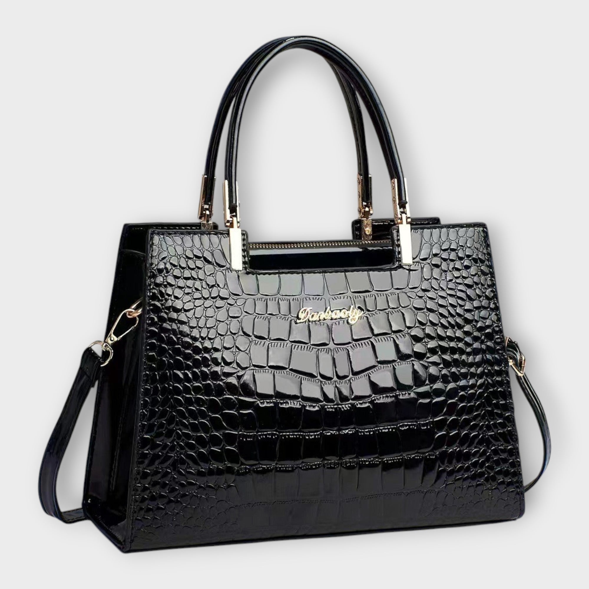 Bolso de mano con estampado de cocodrilo brillante