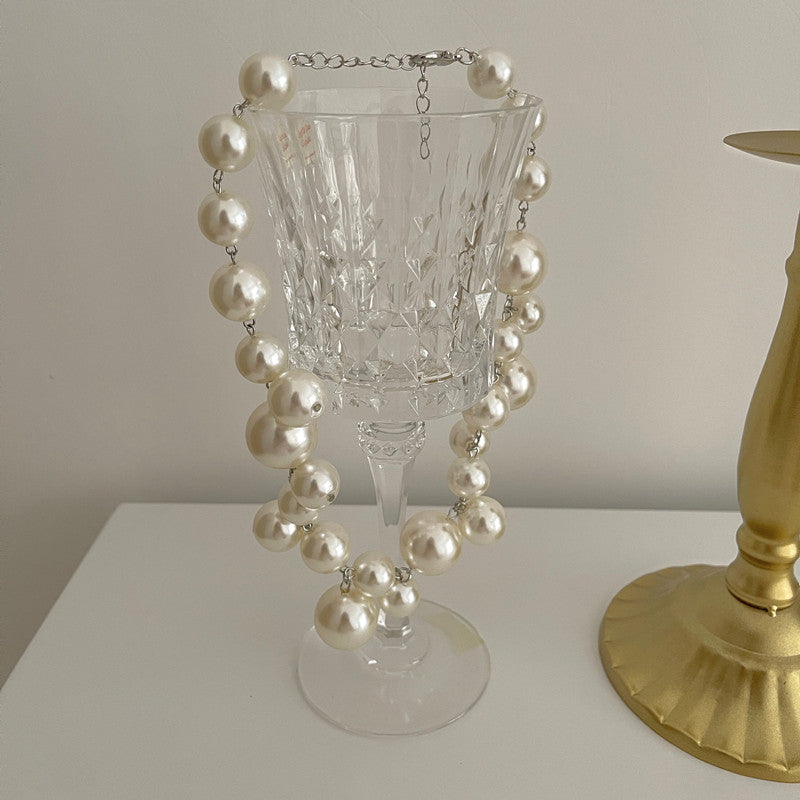 Encantadora cadena de perlas