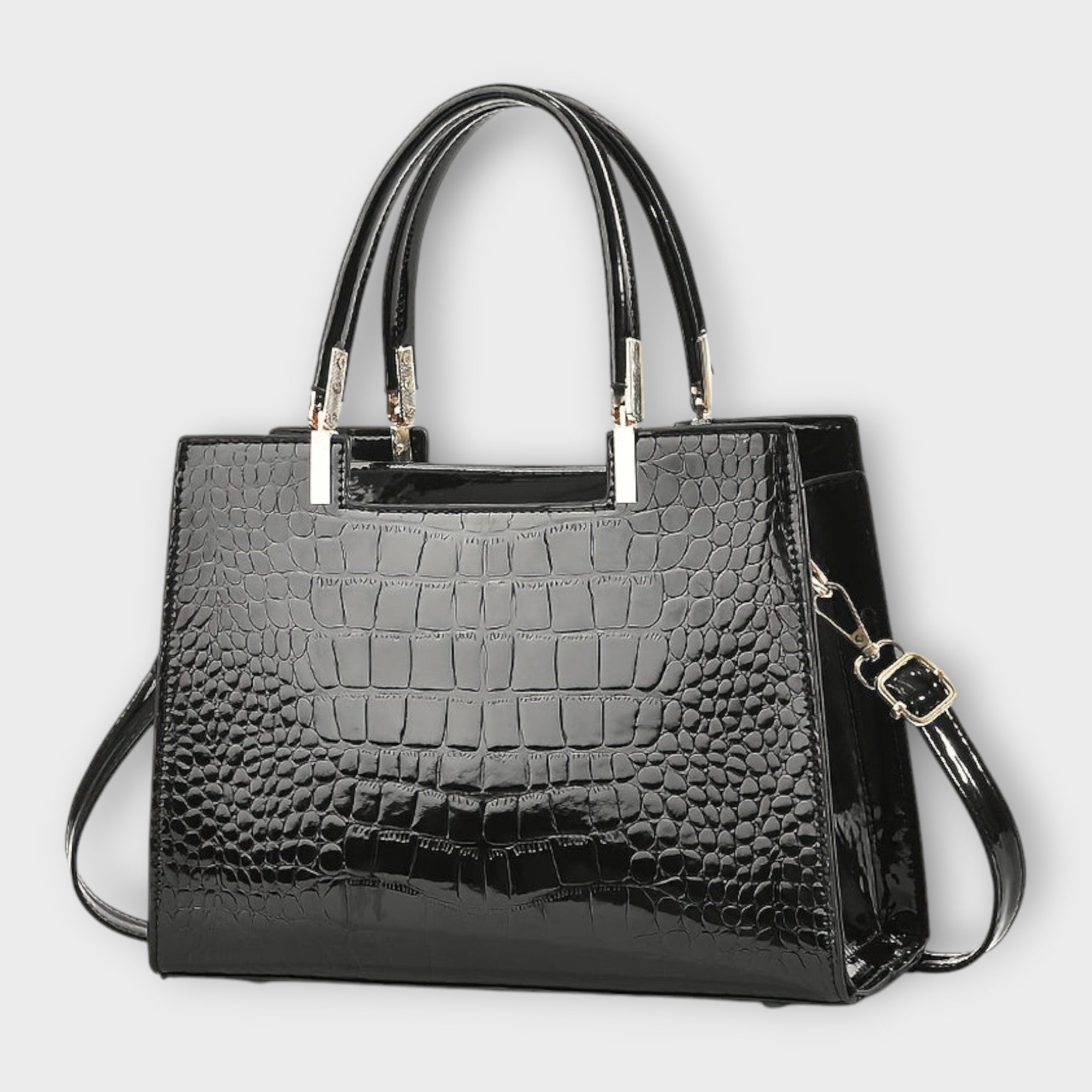 Bolso de mano con estampado de cocodrilo brillante
