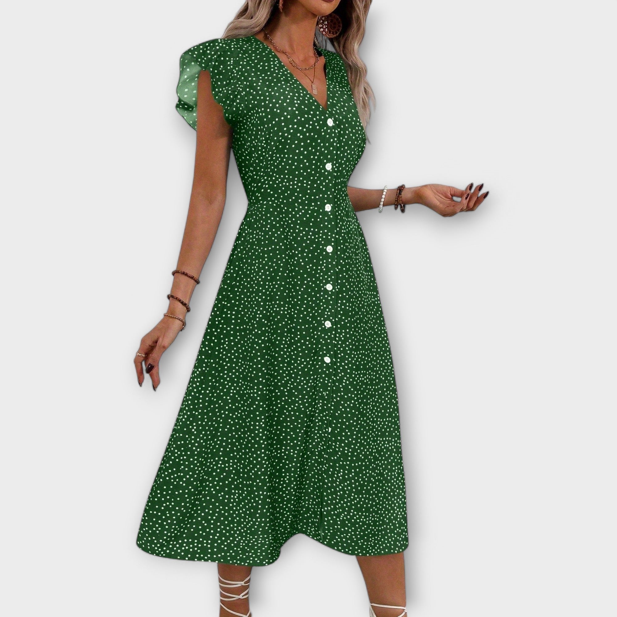 Elegante vestido midi con lunares