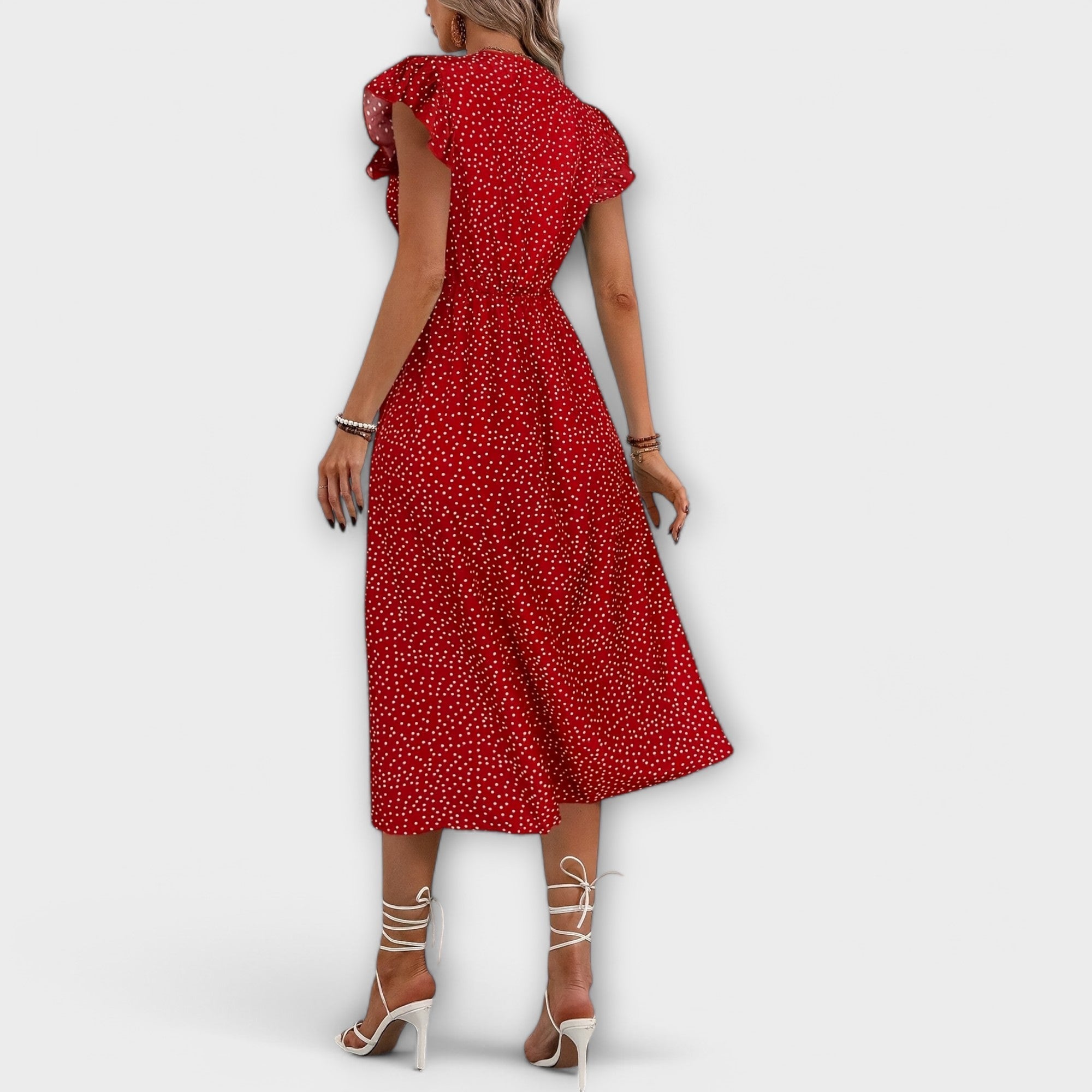Elegante vestido midi con lunares